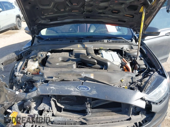 2018 Ford Fusion SE z VIN 3FA6P0LU8JR116073, wystawiony jako IAAI lot #41773037 z przebiegiem 100 864 mil mil oraz . Historia ofert i sprzedaży dostępna na DreamBid. Obrazek 10.
