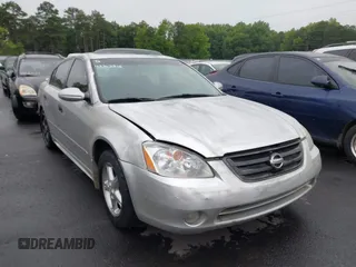 2003 Nissan Altima SE z VIN 1N4BL11E13C177276, wystawiony jako IAAI lot #42362816 z przebiegiem 204 700 mil mil oraz . Historia ofert i sprzedaży dostępna na DreamBid. Obrazek 1.