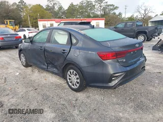2021 Kia Forte FE with VIN 3KPF24AD3ME353858, listed as a IAAI auction lot 41791691 with 57,970 mi miles and . Bid and sale history available at carsss.com. Image 3.