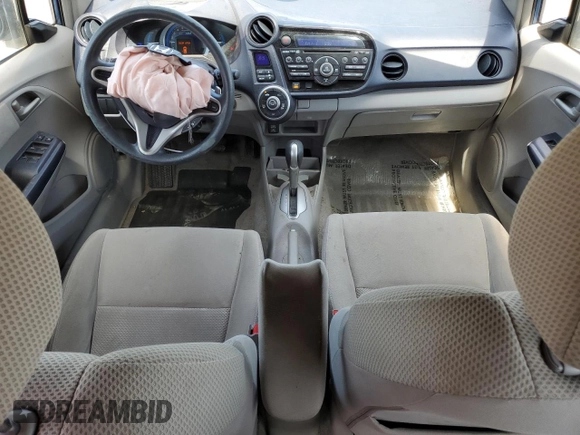 2010 Honda Insight EX with VIN JHMZE2H75AS008122, listed as a Copart auction lot 53894545 with 171,926 mi miles and Salvage title. Bid and sale history available at DreamBid. Image 8.