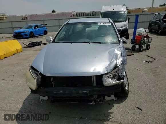 2007 Kia Spectra EX with VIN KNAFE121275411319, listed as a Copart auction lot 58716045 with 309,488 mi miles and Salvage title. Bid and sale history available at DreamBid. Image 13.