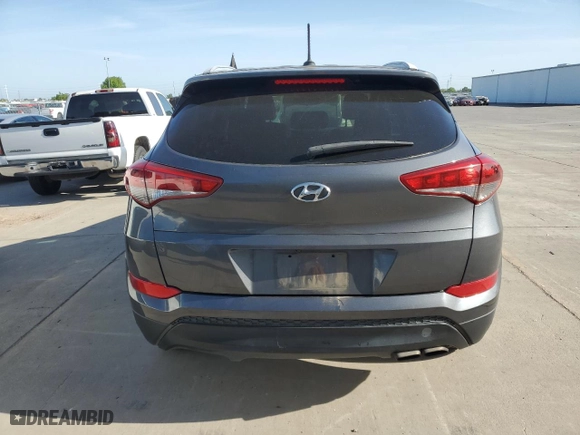 2017 Hyundai Tucson Value with VIN KM8J33A25HU401072, listed as a Copart auction lot 53973115 with 138,204 mi miles and Salvage Title. Bid and sale history available at carsss.com. Image 6.