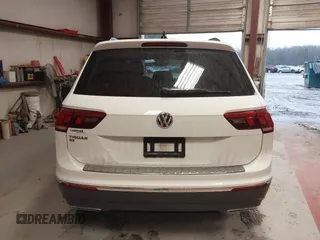 2020 Volkswagen Tiguan SE with VIN 3VV3B7AX4LM141023, listed as a IAAI auction lot 41521923 with 69,479 mi miles and . Bid and sale history available at DreamBid. Image 17.