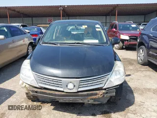 2009 Nissan Versa 1.8 S with VIN 3N1BC13E59L499006, listed as a IAAI auction lot 41953194 with 179,330 mi miles. Bid and sale history available at carsss.com. Image 12.