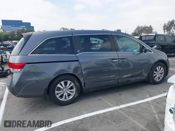 2014 Honda Odyssey EX-L with VIN 5FNRL5H64EB026520, listed as a IAAI auction lot 42562290 with 118,890 mi miles and . Bid and sale history available at DreamBid. Image 13.