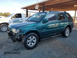1999 Isuzu Rodeo S z VIN 4S2CK58W6X4352441, wystawiony jako Copart lot #81915384 z przebiegiem 338 513 mil mil oraz Nie do naprawy • Non repairable. Historia ofert i sprzedaży dostępna na DreamBid. Obrazek 1.