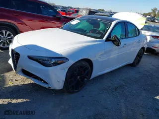 2020 Alfa Romeo Giulia Ti Sport with VIN ZARFANBN5L7638386, listed as a IAAI auction lot 41380295 with 33,733 mi miles. Bid and sale history available at carsss.com. Image 2.