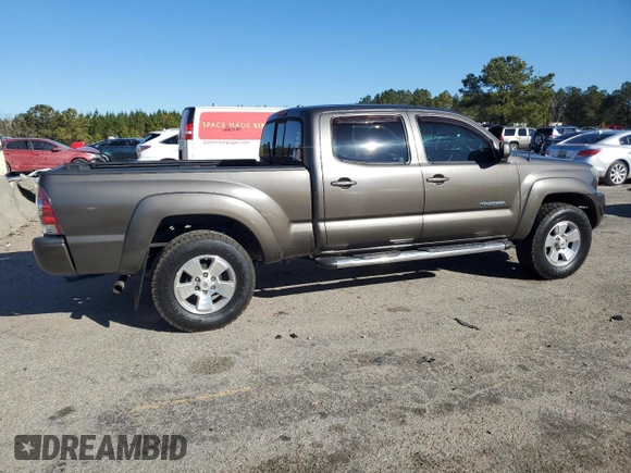 2010 Toyota Tacoma PreRunner with VIN 3TMKU4HN3AM025218, listed as a Copart auction lot 87600035 with 92,605 mi miles and Salvage title. Bid and sale history available at DreamBid. Image 3.
