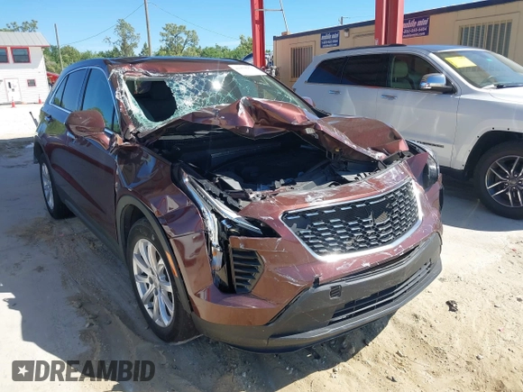 2022 Cadillac XT4 FWD Luxury with VIN 1GYAZAR42NF162880, listed as a IAAI auction lot 41850951 with 47,344 mi miles and . Bid and sale history available at carsss.com. Image 1.