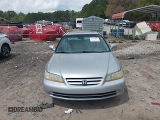 2002 Honda Accord EX z VIN 1HGCG56642A161161, wystawiony jako IAAI lot #41966381 z przebiegiem 258 103 mil mil oraz . Historia ofert i sprzedaży dostępna na DreamBid. Obrazek 12.