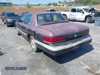 1992 Mercury Grand Marquis LS z VIN 2MECM75W4NX749141, wystawiony jako IAAI lot #42413769 z przebiegiem 296 805 mil mil oraz . Historia ofert i sprzedaży dostępna na DreamBid. Obrazek 3.