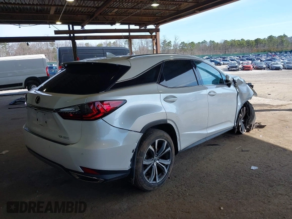 2021 Lexus RX 350 with VIN 2T2HZMDA9MC305457, listed as a IAAI auction lot 42052521 with 24,015 mi miles and . Bid and sale history available at DreamBid. Image 4.