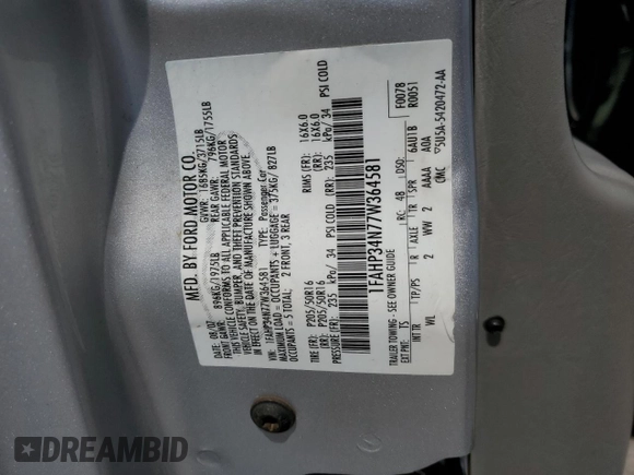 2007 Ford Focus S with VIN 1FAHP34N77W364581, listed as a Copart auction lot 52179835 with 111,701 mi miles and Salvage Title. Bid and sale history available at carsss.com. Image 12.