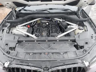 2021 BMW X6 xDrive40i with VIN 5UXCY6C07M9G44005, listed as a IAAI auction lot 41428636 with 65,670 mi miles. Bid and sale history available at carsss.com. Image 10.
