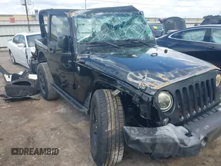 2016 Jeep Wrangler Willys Wheeler z VIN 1C4AJWAG5GL145673, wystawiony jako IAAI lot #42217498 z przebiegiem 132 383 mil mil oraz . Historia ofert i sprzedaży dostępna na DreamBid. Obrazek 1.