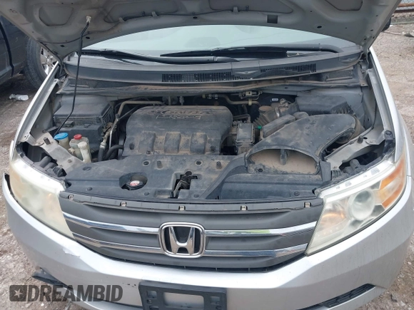 2012 Honda Odyssey EX-L with VIN 5FNRL5H66CB081323, listed as a IAAI auction lot 42465110 with 266,934 mi miles and . Bid and sale history available at DreamBid. Image 10.
