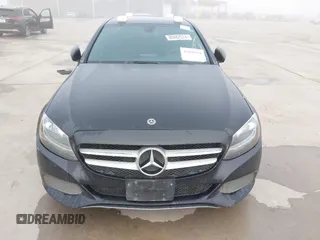 2018 Mercedes-Benz C 300 with VIN 55SWF4JB8JU234808, listed as a IAAI auction lot 41869594 with 220,883 mi miles and . Bid and sale history available at carsss.com. Image 6.