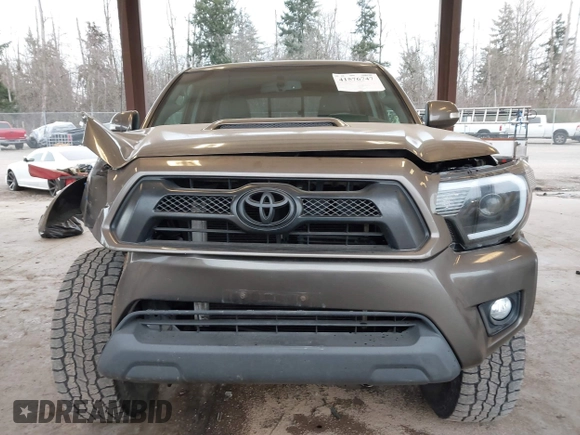 2013 Toyota Tacoma z VIN 3TMLU4EN9DM124980, wystawiony jako IAAI lot #41576747 z przebiegiem 209 883 mil mil oraz . Historia ofert i sprzedaży dostępna na DreamBid. Obrazek 12.