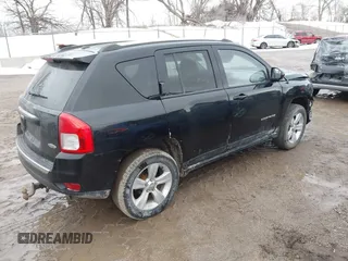 2015 Jeep Compass High Altitude Edition with VIN 1C4NJDEB9FD396502, listed as a IAAI auction lot 41757194 with 157,928 mi miles. Bid and sale history available at carsss.com. Image 4.