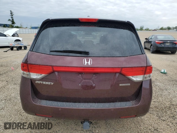 2016 Honda Odyssey Touring Elite with VIN 5FNRL5H9XGB109463, listed as a Copart auction lot 57483225 with 182,450 mi miles and Salvage title. Bid and sale history available at DreamBid. Image 6.