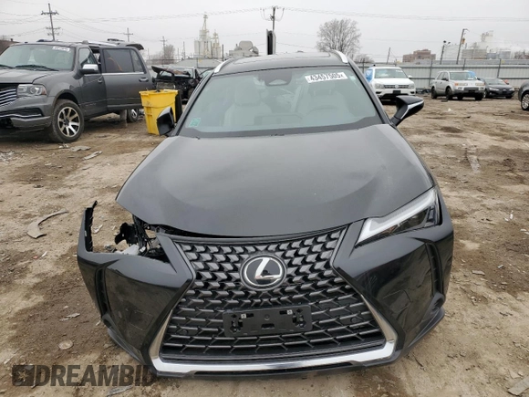 2025 Lexus UX with VIN JTHUCJDH5S2003058, listed as a Copart auction lot 43457505 with 1,239 mi miles and Salvage Title. Bid and sale history available at carsss.com. Image 5.