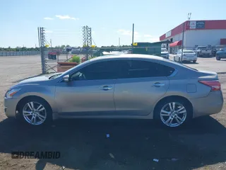 2013 Nissan Altima SL z VIN 1N4BL3AP3DC288653, wystawiony jako IAAI lot #42304043 z przebiegiem 108 640 mil mil oraz . Historia ofert i sprzedaży dostępna na DreamBid. Obrazek 14.