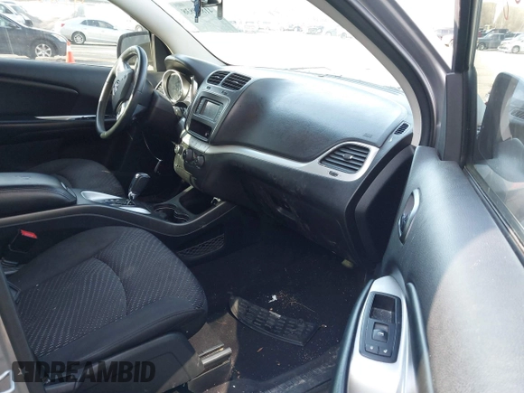 2015 Dodge Journey SE z VIN 3C4PDCAB7FT719679, wystawiony jako IAAI lot #41839838 z przebiegiem 119 610 mil mil oraz . Historia ofert i sprzedaży dostępna na DreamBid. Obrazek 5.