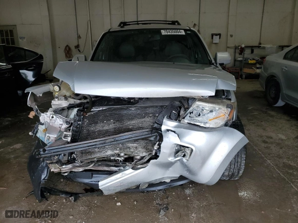 2010 Mercury Mariner Premier with VIN 4M2CN8HG4AKJ10385, listed as a Copart auction lot 70435004 with 133,615 mi miles and Salvage Title. Bid and sale history available at carsss.com. Image 5.