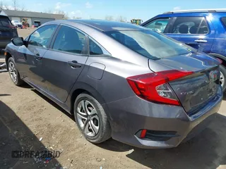 2018 Honda Civic LX with VIN 2HGFC2F5XJH586527, listed as a IAAI auction lot 42080372 with 52,114 mi miles and . Bid and sale history available at DreamBid. Image 3.