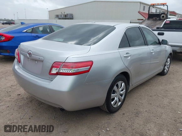 2010 Toyota Camry with VIN 4T1BF3EK5AU556913, listed as a IAAI auction lot 41936130 with 117,707 mi miles and . Bid and sale history available at DreamBid. Image 4.