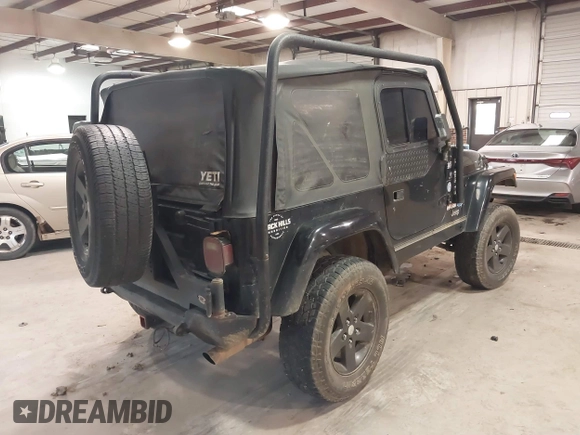 1999 Jeep Wrangler Sahara z VIN 1J4FY49S4XP432567, wystawiony jako IAAI lot #41562455 z przebiegiem Nie podano mil oraz . Historia ofert i sprzedaży dostępna na DreamBid. Obrazek 4.