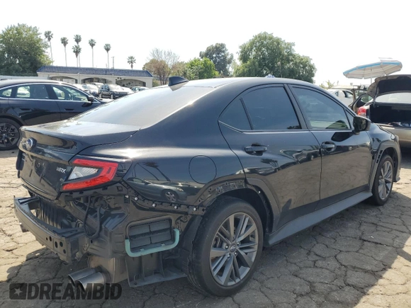 2023 Subaru WRX with VIN JF1VBAA61P9807986, listed as a Copart auction lot 49734655 with 26,908 mi miles and Salvage title. Bid and sale history available at DreamBid. Image 3.