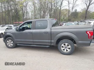 2015 Ford F-150 XL with VIN 1FTEW1CF4FFA75879, listed as a IAAI auction lot 41923278 with 198,146 mi miles and . Bid and sale history available at DreamBid. Image 14.