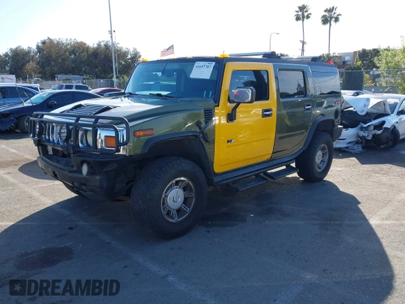 2003 Hummer H2 z VIN 5GRGN23UX3H124727, wystawiony jako IAAI lot #41697787 z przebiegiem 241 554 mil mil oraz . Historia ofert i sprzedaży dostępna na DreamBid. Obrazek 2.