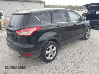 2016 Ford Escape SE with VIN 1FMCU0G72GUA64804, listed as a IAAI auction lot 42062058 with 157,639 mi miles. Bid and sale history available at carsss.com. Image 4.