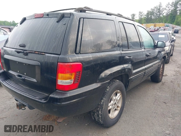 2000 Jeep Grand Cherokee Laredo with VIN 1J4G258S0YC182928, listed as a IAAI auction lot 42113376 with 259,882 mi miles and . Bid and sale history available at DreamBid. Image 4.