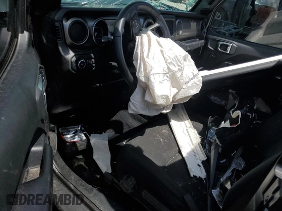2019 Jeep Wrangler Sport S with VIN 1C4GJXAG4KW569059, listed as a Copart auction lot 60546945 with 57,131 mi miles and Non repairable. Bid and sale history available at DreamBid. Image 8.