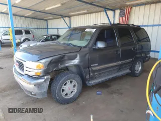 2001 GMC Yukon SLT z VIN 1GKEK13T21J165558, wystawiony jako Copart lot #52200565 z przebiegiem 291 699 mil mil oraz Szkoda całkowita • Salvage title. Historia ofert i sprzedaży dostępna na DreamBid. Obrazek 1.