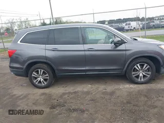 2017 Honda Pilot EX-L with VIN 5FNYF6H5XHB029443, listed as a IAAI auction lot 41992115 with 154,399 mi miles and . Bid and sale history available at DreamBid. Image 13.