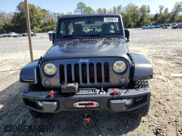 2014 Jeep Wrangler Rubicon with VIN 1C4BJWCG1EL168575, listed as a Copart auction lot 75095814 with 65,770 mi miles and Salvage title. Bid and sale history available at DreamBid. Image 5.