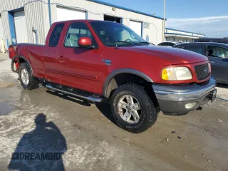 2002 Ford F-150 XL with VIN 1FTRX18L82NA54692, listed as a Copart auction lot 62559605 with 216,350 mi miles and Salvage title. Bid and sale history available at DreamBid. Image 4.