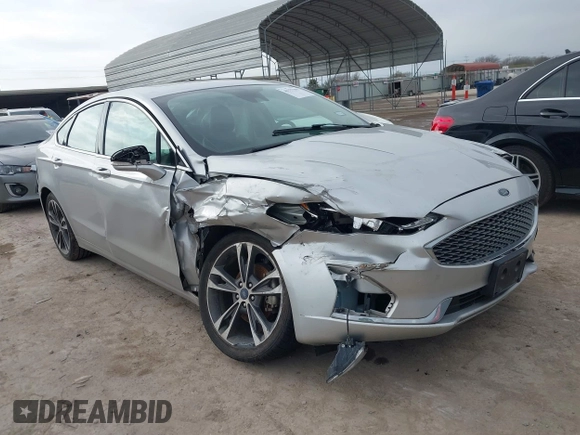 2019 Ford Fusion Titanium with VIN 3FA6P0D9XKR206465, listed as a IAAI auction lot 41577306 with 70,668 mi miles. Bid and sale history available at carsss.com. Image 1.