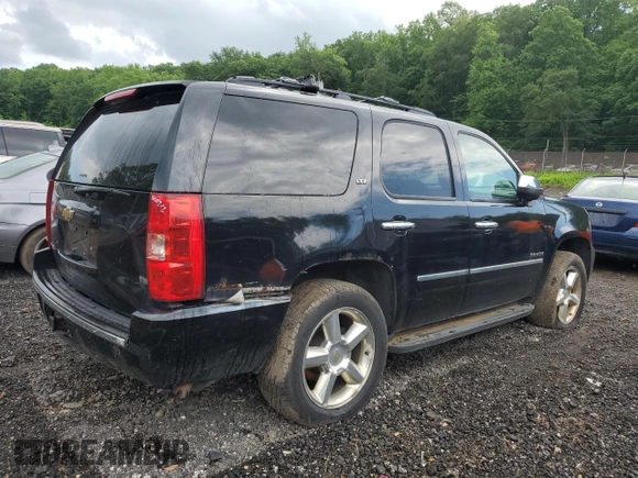2010 Chevrolet Tahoe LTZ with VIN 1GNUKCE05AR164175, listed as a Copart auction lot 57223295 with 423,010 mi miles and Salvage title. Bid and sale history available at DreamBid. Image 3.