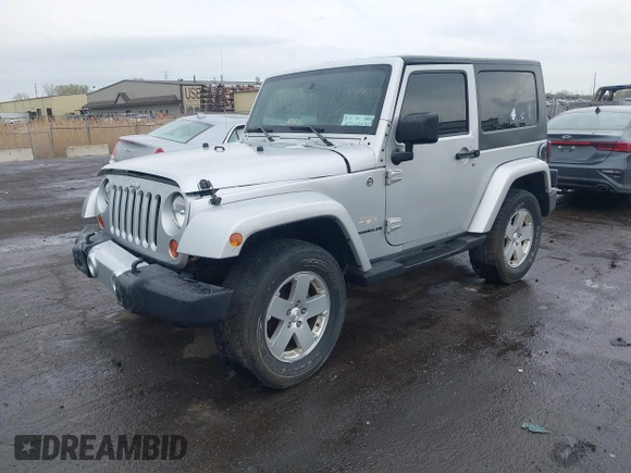 2010 Jeep Wrangler Sahara с VIN 1J4AA5D10AL166398, выставлен на аукционе IAAI как лот 42144530 с пробегом 140 020 миль миль и . История ставок и продаж доступна на DreamBid. Изображение 2.