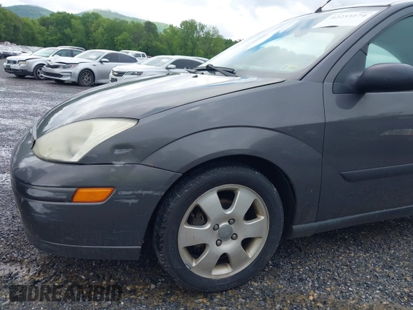 2002 Ford Focus ZX3 with VIN 3FAFP31322R232138, listed as a IAAI auction lot 42253174 with 178,405 mi miles and . Bid and sale history available at DreamBid. Image 13.