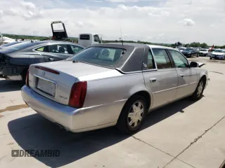 2004 Cadillac DeVille z VIN 1G6KD54Y14U196655, wystawiony jako Copart lot #50882364 z przebiegiem 80 588 mil mil oraz Szkody całkowita. Historia ofert i sprzedaży dostępna na DreamBid. Obrazek 3.