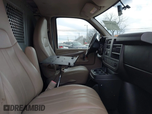 2014 Chevrolet Express Cargo Van with VIN 1GCWGGCA4E1209164, listed as a IAAI auction lot 41838141 with 174,770 mi miles. Bid and sale history available at carsss.com. Image 5.