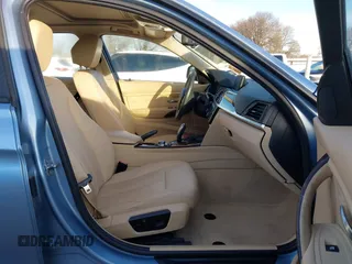 2013 BMW 3 Series 320i with VIN WBA3B1C56DK128089, listed as a IAAI auction lot 41332091 with 101,155 mi miles. Bid and sale history available at carsss.com. Image 4.