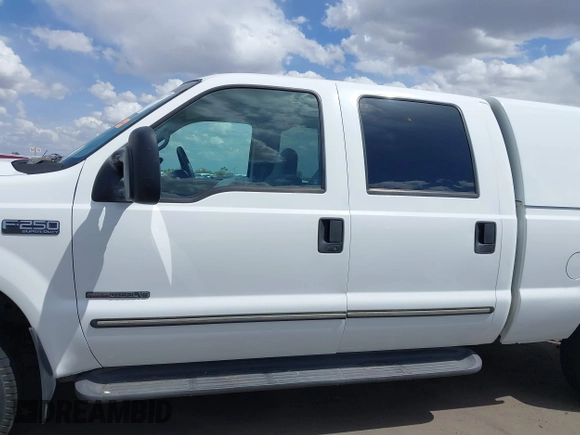 2000 Ford F-250 XL with VIN 1FTNW21F1YEB77397, listed as a IAAI auction lot 41934134 with 344,782 mi miles and . Bid and sale history available at DreamBid. Image 14.