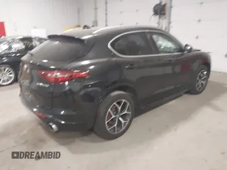 2020 Alfa Romeo Stelvio Ti z VIN ZASPAKBN5L7C91663, wystawiony jako IAAI lot #41816765 z przebiegiem 40 972 mil mil oraz . Historia ofert i sprzedaży dostępna na DreamBid. Obrazek 4.